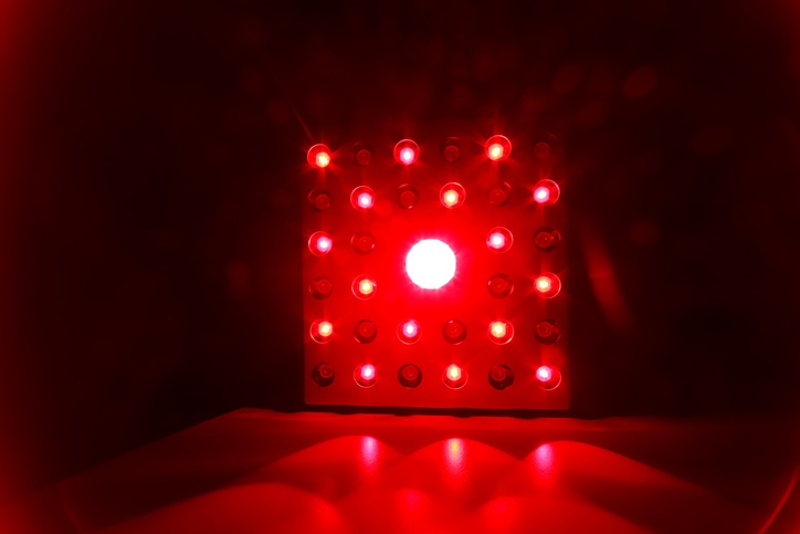 Red LED light panel glowing brightly with multiple illuminated bulbs in Portland, OR